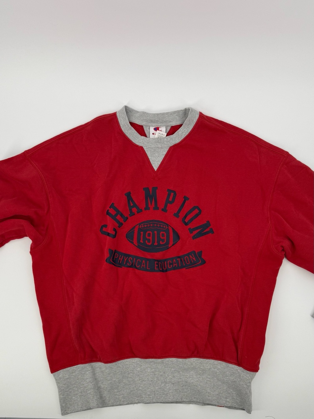 Champion Red Crewneck Sweatshirt with Gray Trim and Navy Graphic